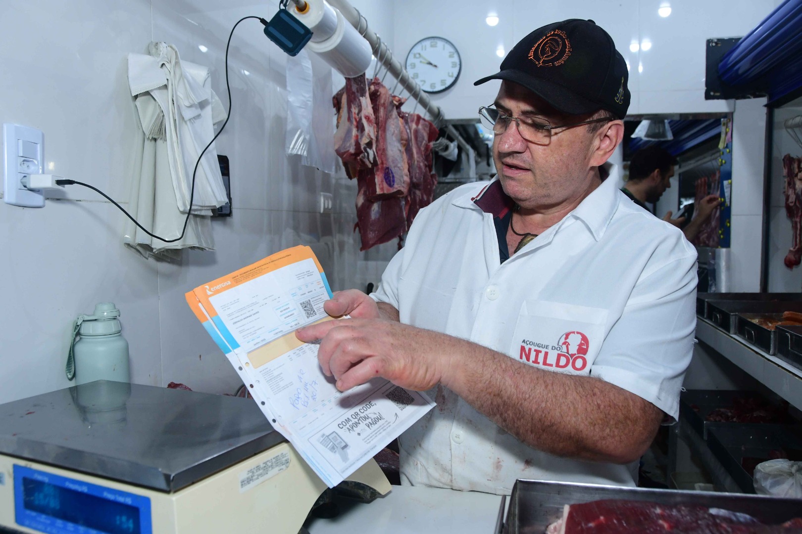 2025.08.15 Bandeira vermelha na conta de energia - Nildo Xavier © Julio Cezar Peres (2).JPG